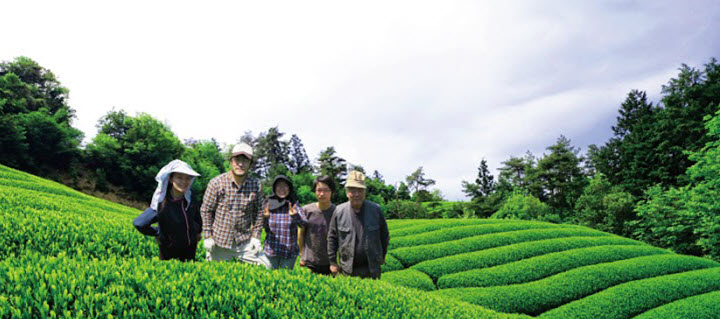 Patriarch Shusaku Azuma, far right, with family and their staff at Azuma Tea Garden near Kyoto, Japan.