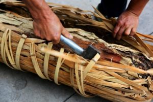 use an axe to break the bamboo lattice wrap