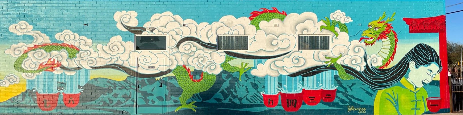 A mural depicting Zhuping Hodge with a green dragon