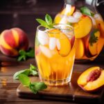 A glass of white sangria made with Oriental Beauty tea