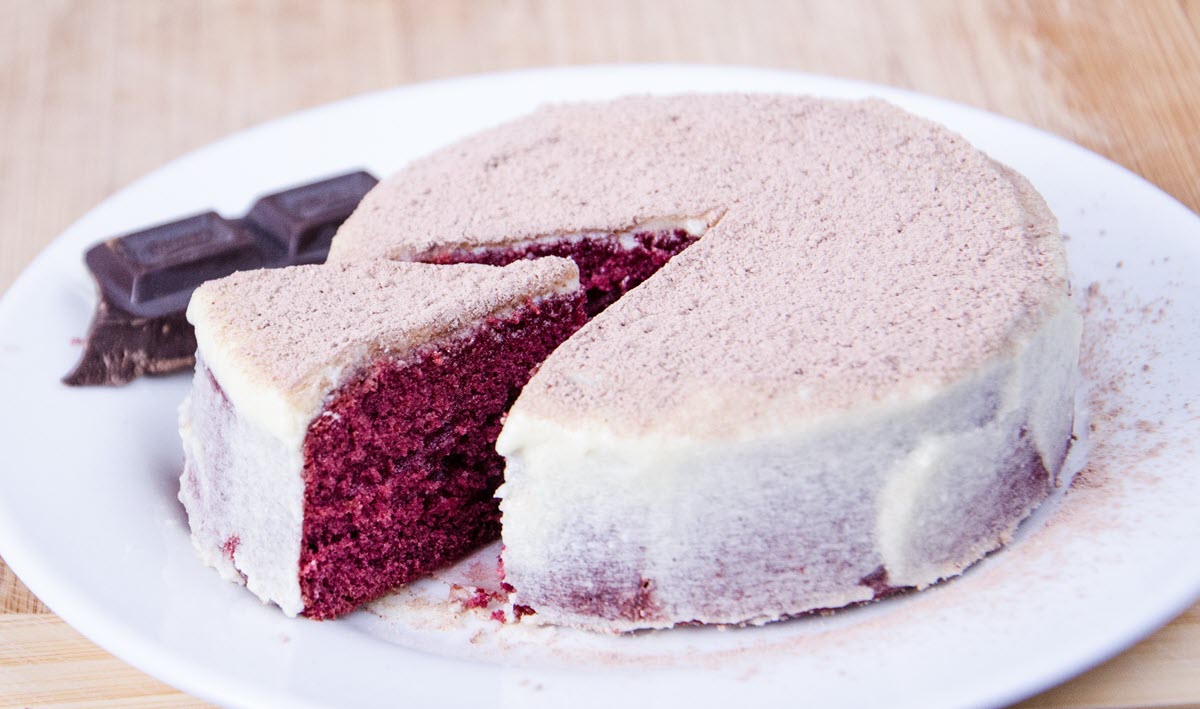 This cake gets its gorgeous deep burgundy color from hibiscus tea powder. Photo by Ronmal Lacamiento